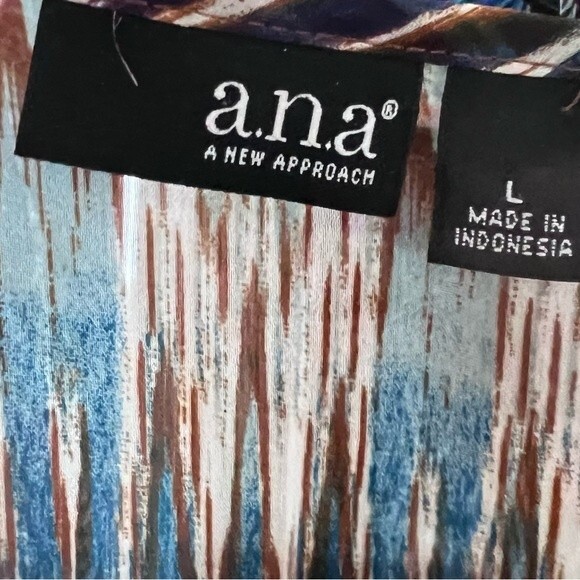 Beautiful colors chiffon peplum top size large - Picture 4 of 6